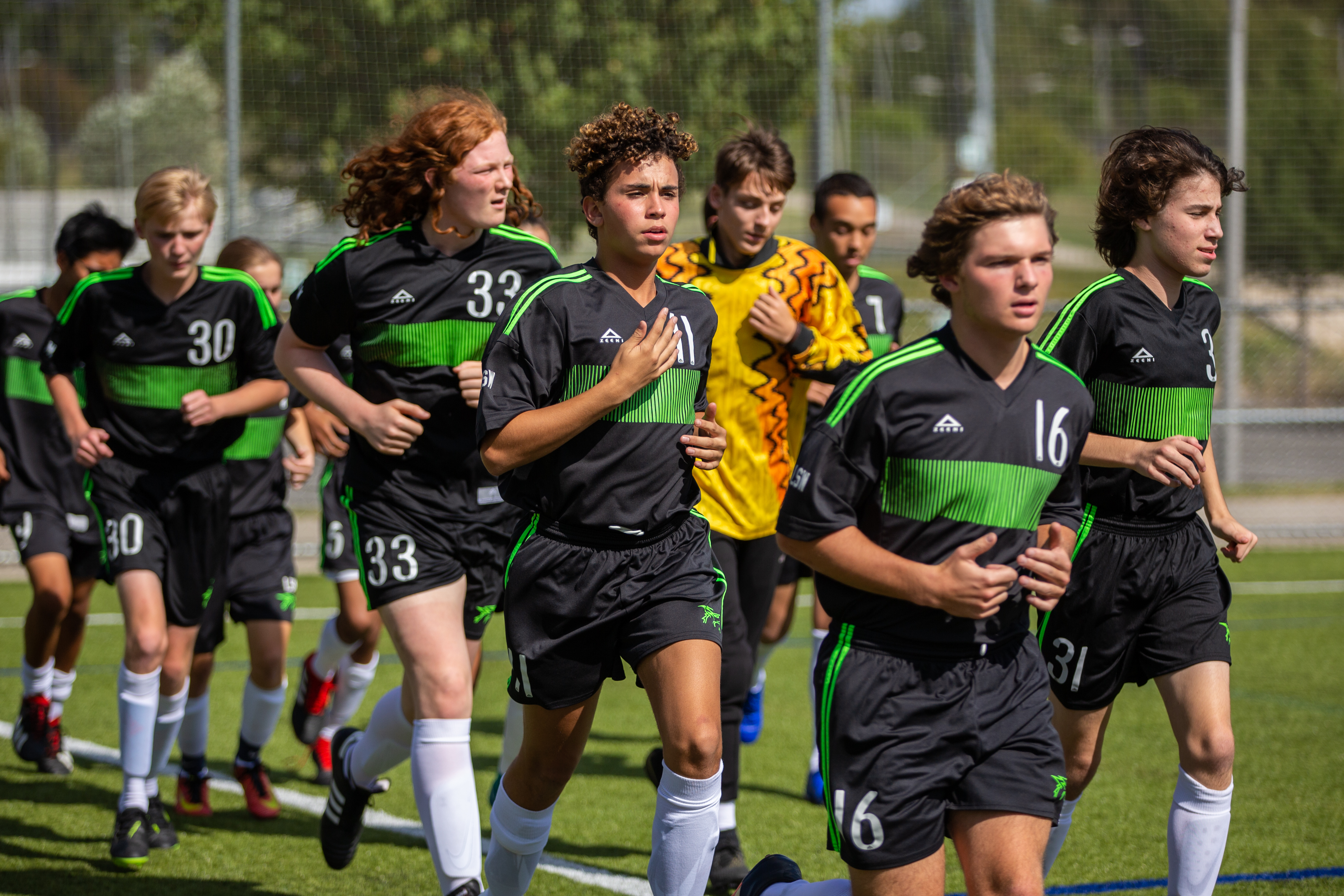 Soccer team running