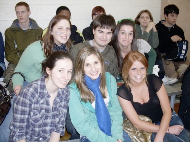 A group of young adults sitting together