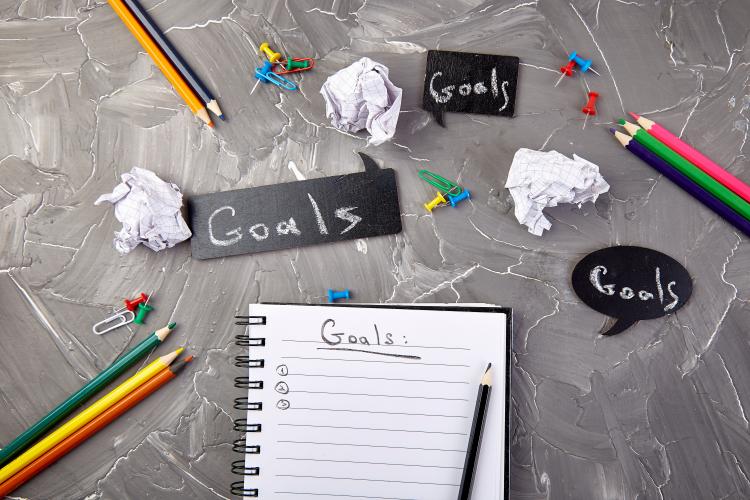 Stock Photo of notebook with "goals" written on page