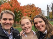 Kim Wargo with husband and daughter outside
