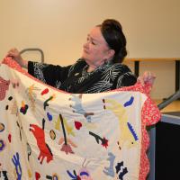 Patricia Polacco with quilt