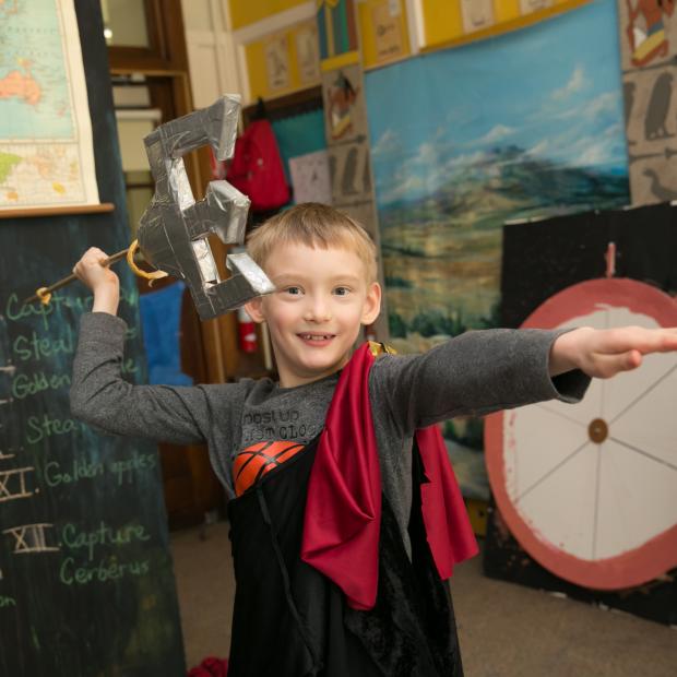 Student wields trident in gods and goddesses club