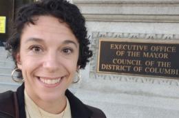 Melissa Wood takes selfie outside of DC Council offices