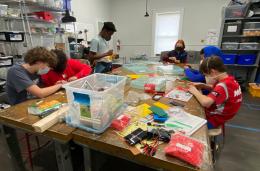 Engineering students work on wind turbine