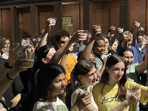 Crowd toasting Shaun Miskell