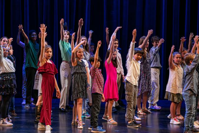 Students on Stage at Theater Opening