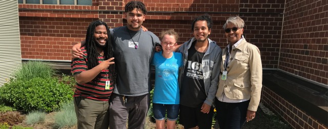 Group of faculty and students outside