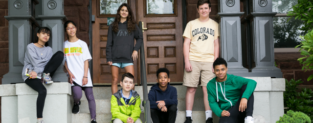 Group of students outside on stairs
