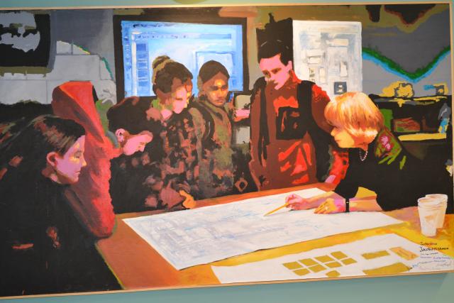 painting of HOS Katherine Schantz with students