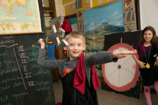 Student wields trident in gods and goddesses club